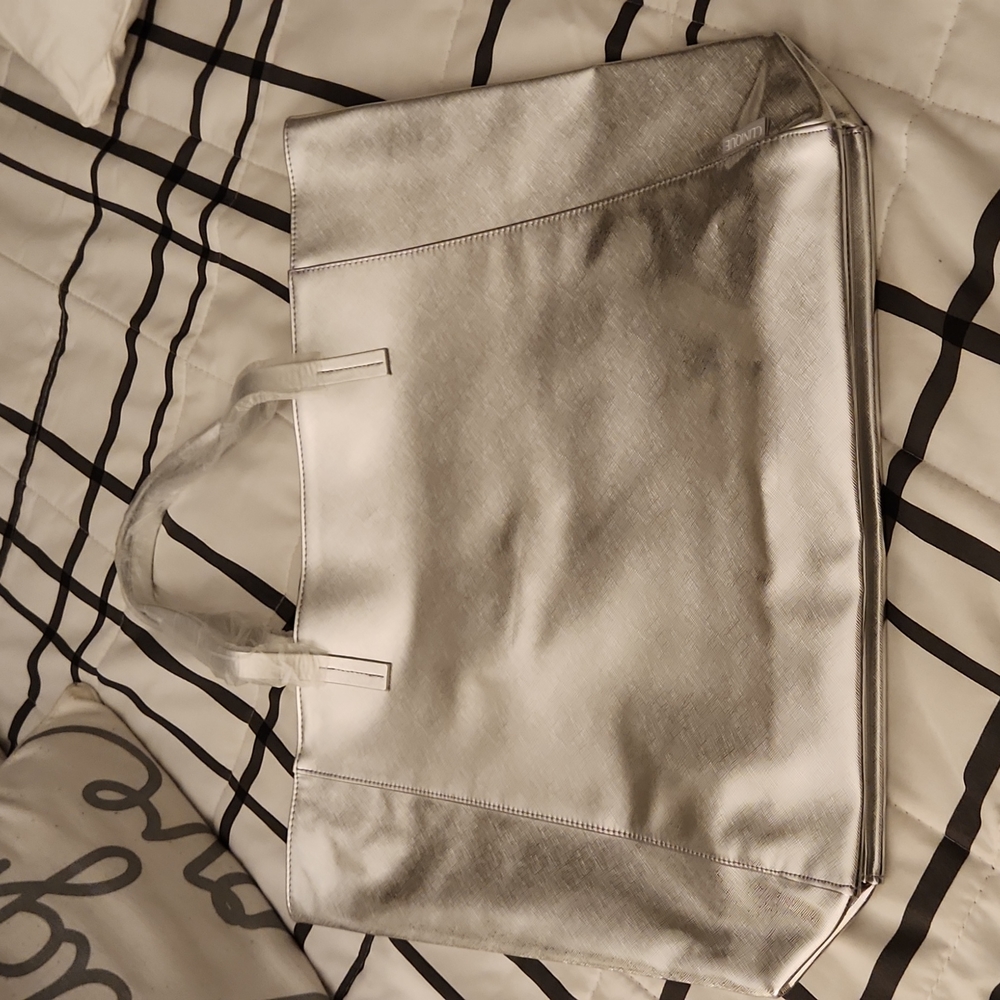 Clinique silver tote bag!